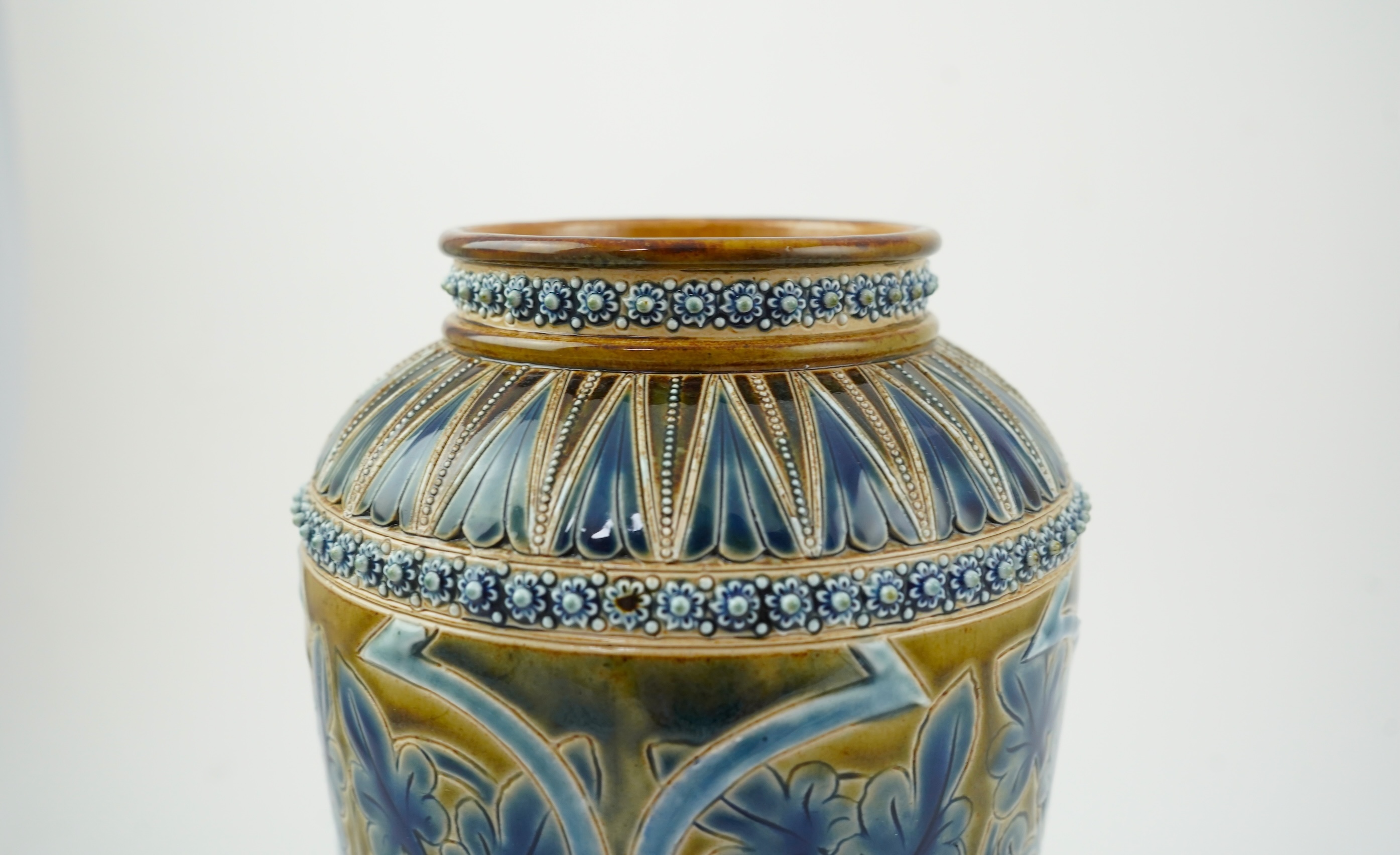 A Doulton Edith Lupton stoneware vase, drill hole to base, together with a similar Martha Rogers silver mounted cup, Tallest 31cm
